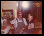 Nathan on the table with Grandfather John Knuth