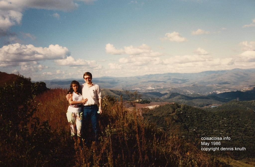 Yvone and Dennis snuggle at a mountain top