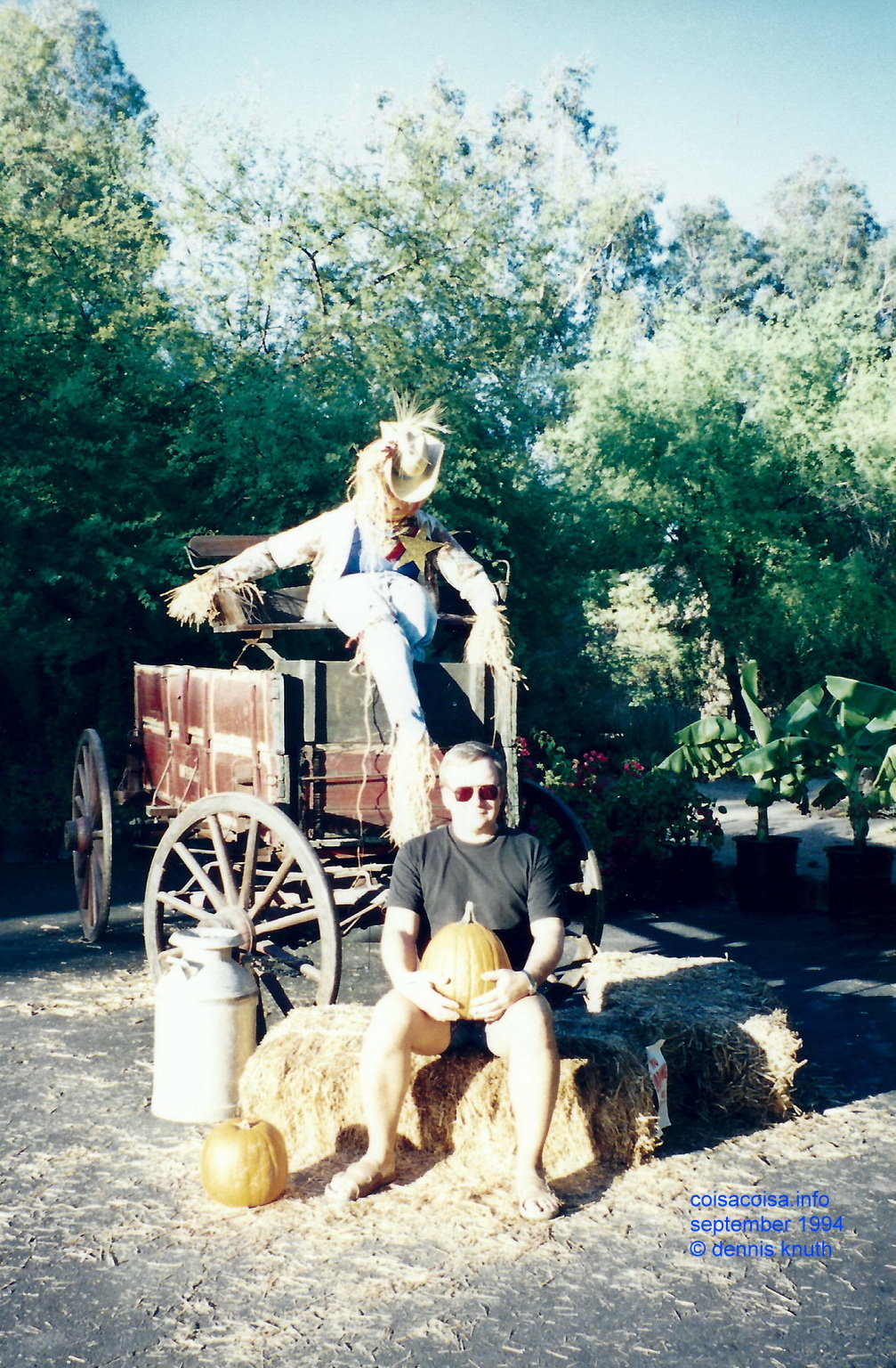 Dennis Knuth with a scarecrow at the Phoenix Zoo