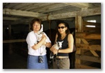 Sherri and Patricia with two baby goats