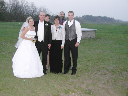 Bride and groom with the Biesecker brother and sister