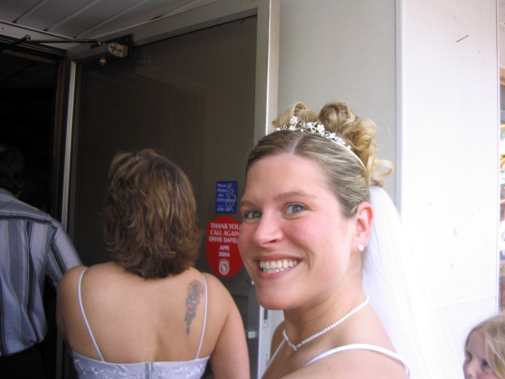 A smile by Kelly after she gets married