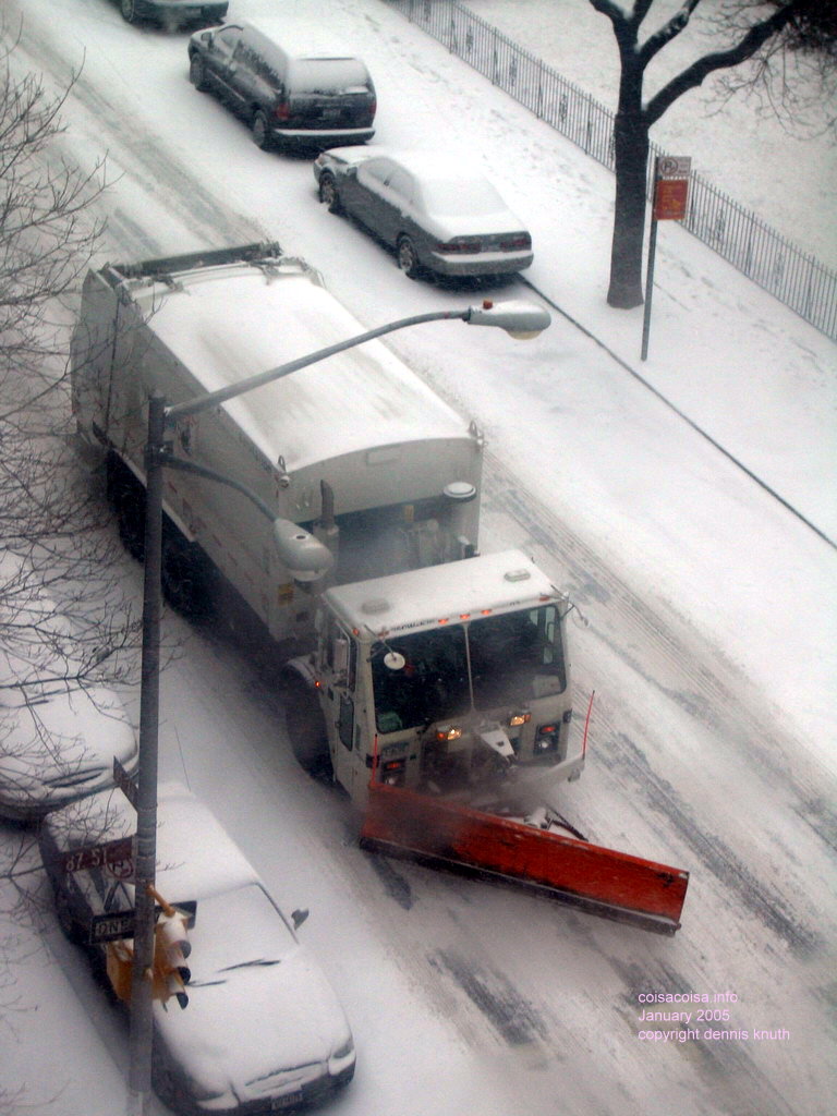 A New York City snow plow garbage truck