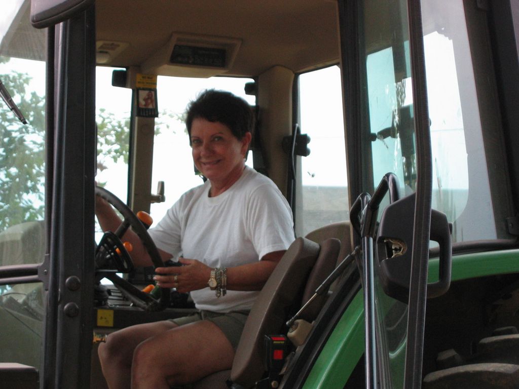 Norma Driving the Tractor on the Durand Farm