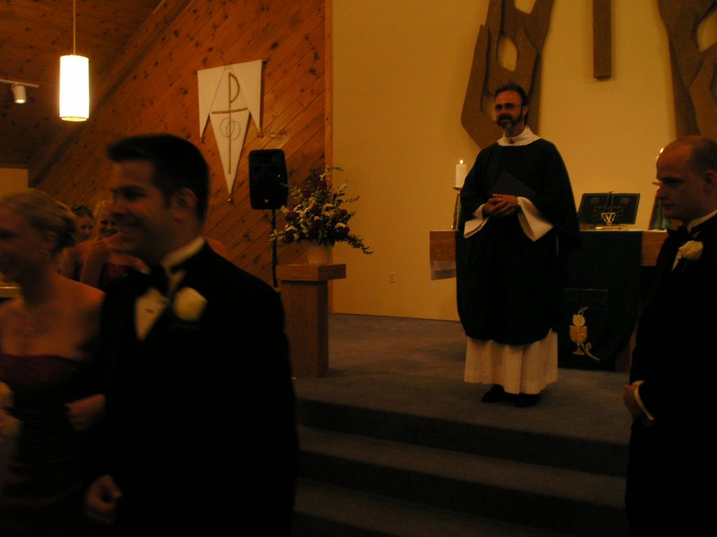 Ryan exits the church with a smile