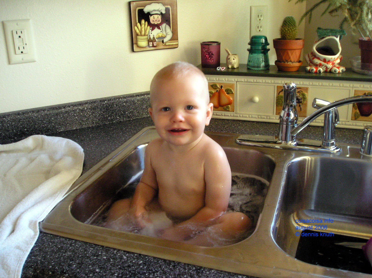 Jared loves sink baths in the kitchen