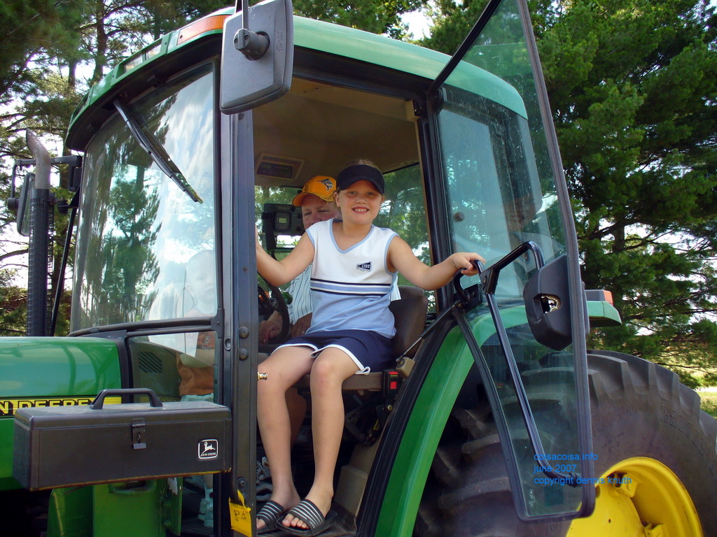 Gary gives Kelsey a ride in his tractor