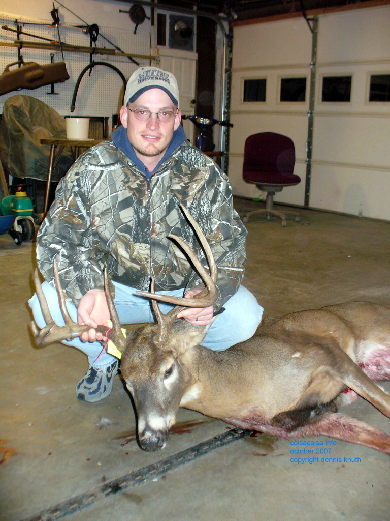 Nate with is prize 10 point buck