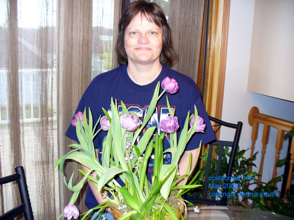 Gifts of flowers makes Sherri happy on Mothers day