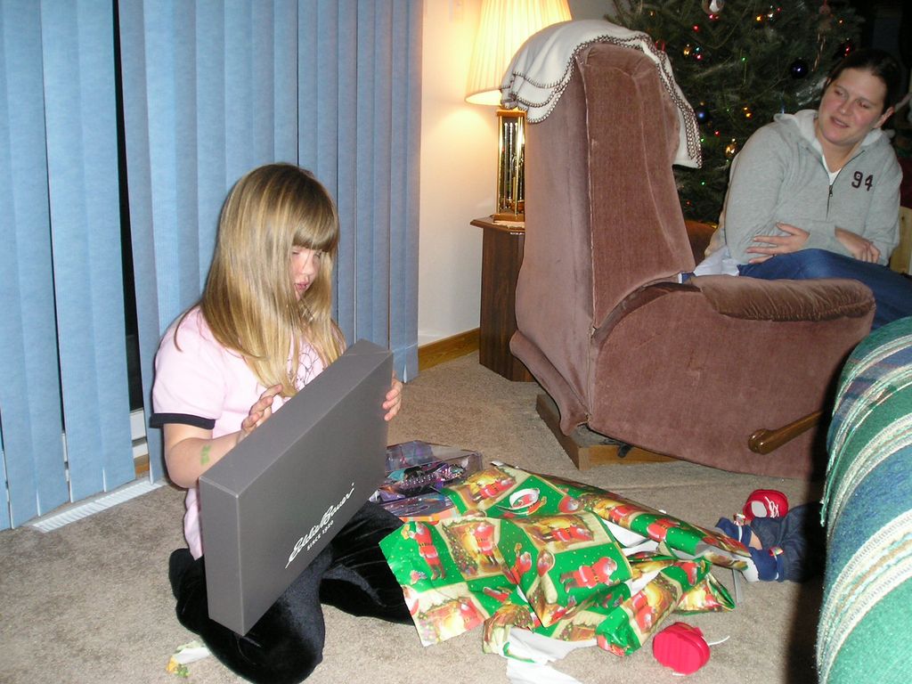 Kelly watches Kelsey open 2004 Christmas gifts