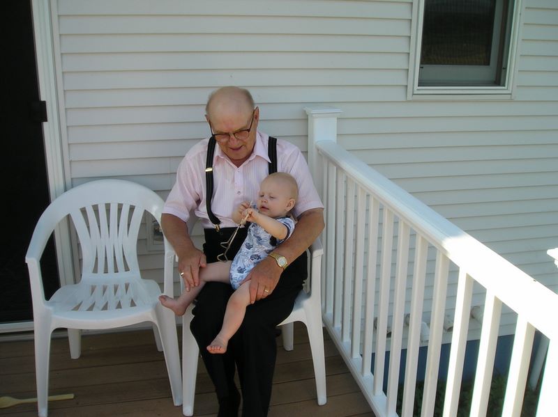 Great Grandpa and Great Grandson play