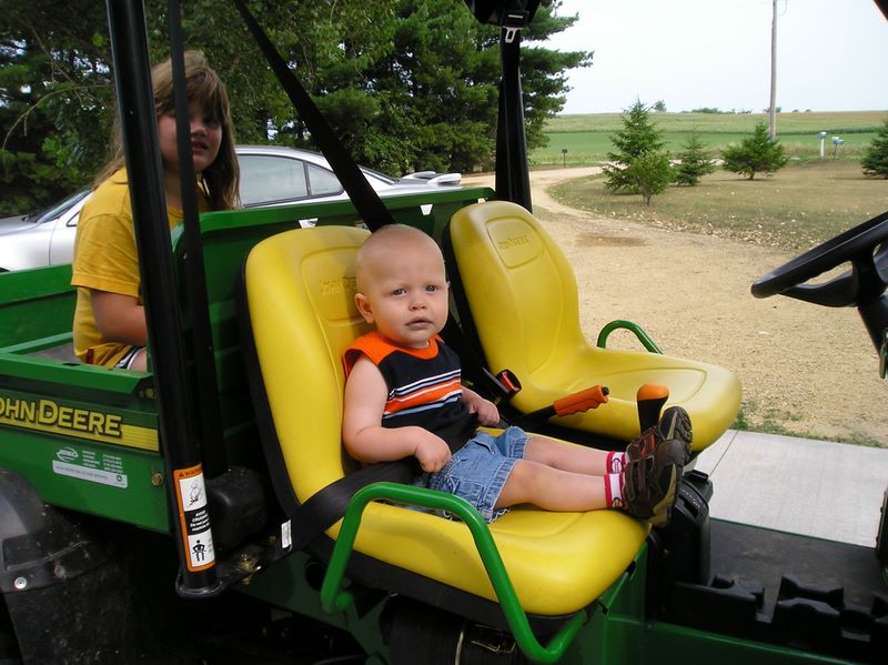 Jared and Kelsey on the John Deere Gator