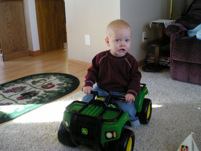 Jared rides his toy Jeeps