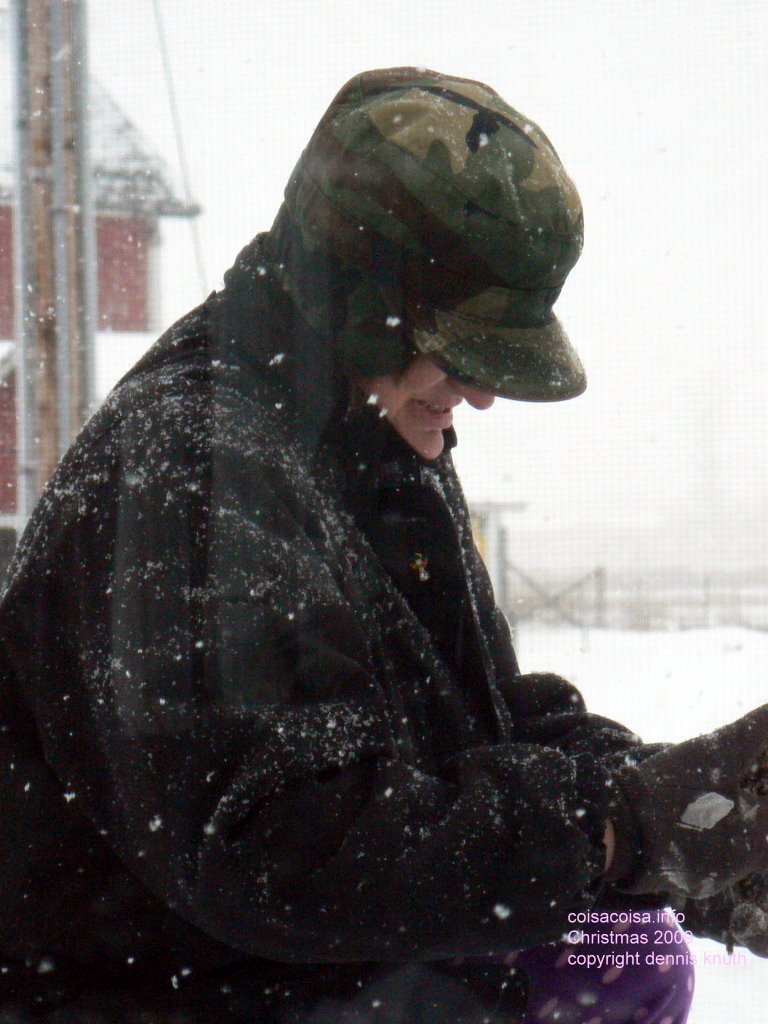 Sherri Donadean bundled up against the snow to feed the birds