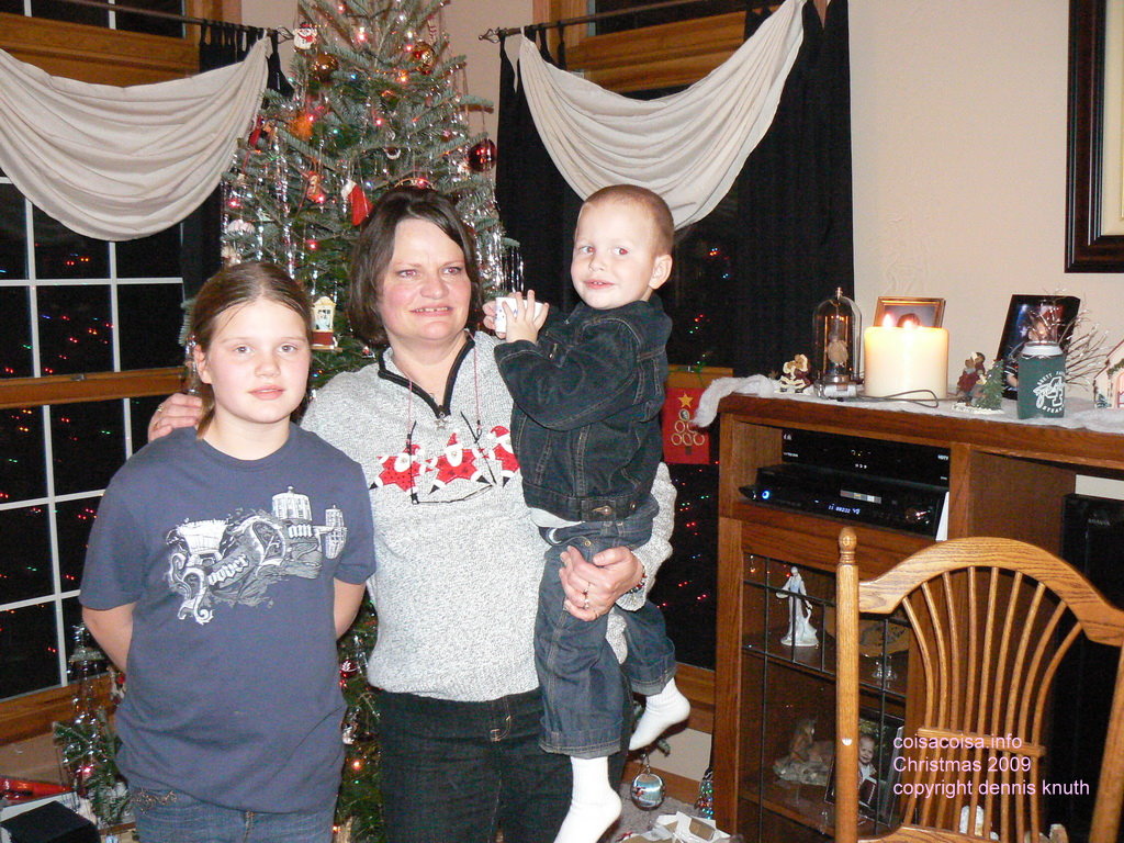 Sherri with her two grandkids