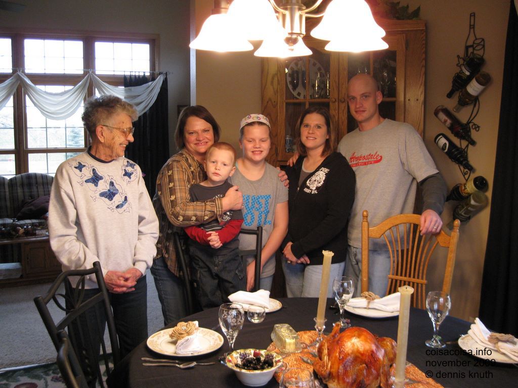 Family Thanksgiving eyes wide closed