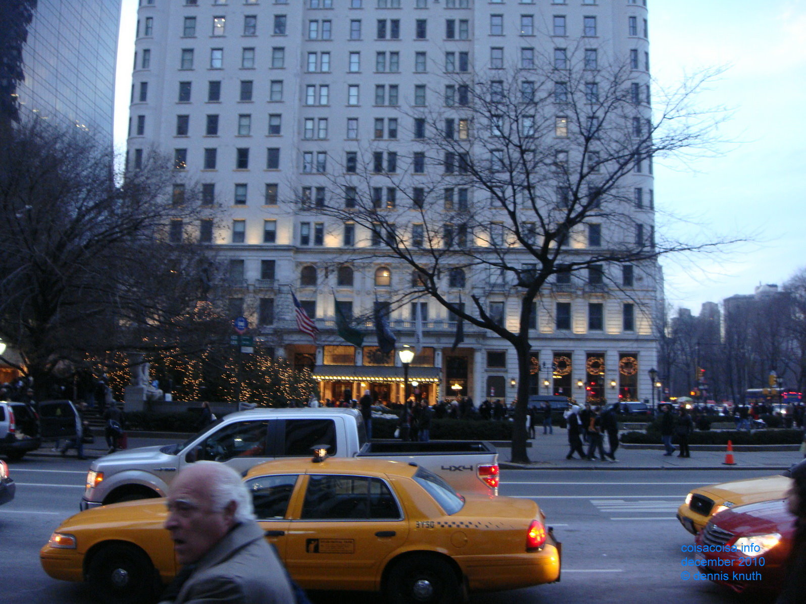Plaza Hotel and a New York Taxi