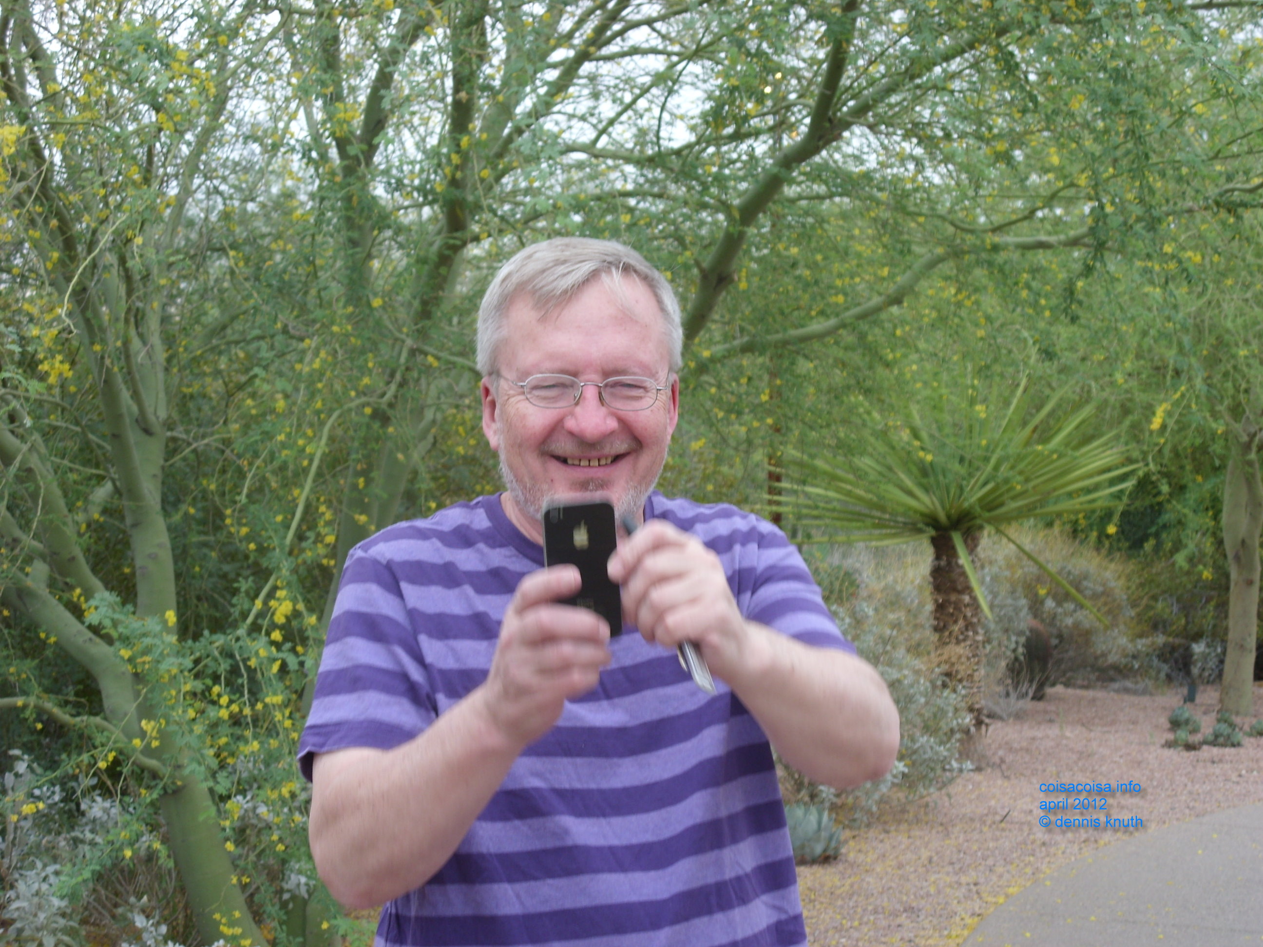 Dennis Knuth takes a photo with is iPhone in Phoenix