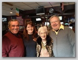 Olga with Dennis, Helton, and the bar owner Lisa