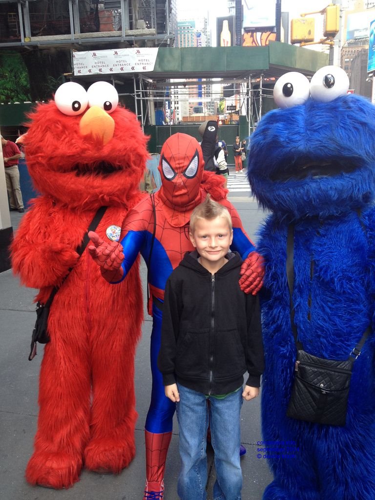 Jared and cartoon characters in Times square