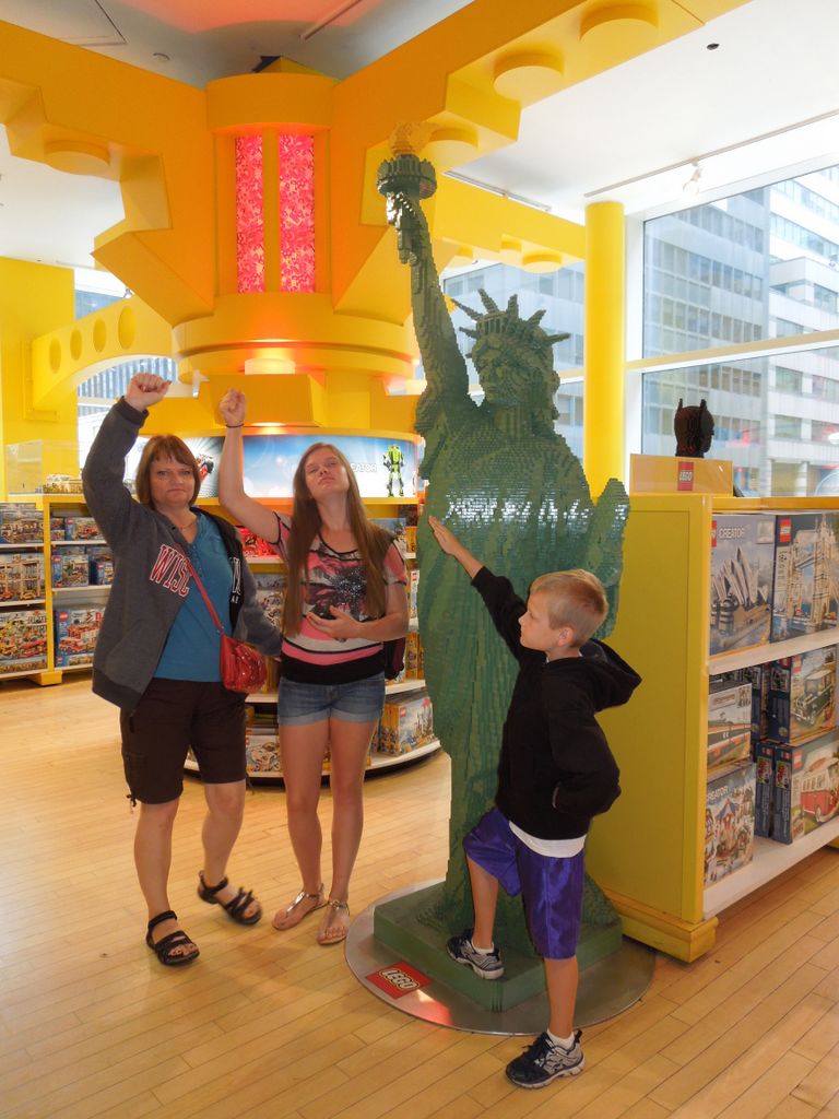 Sherri Kelsey and Jared Mimicking the Leg Statue of Liberty