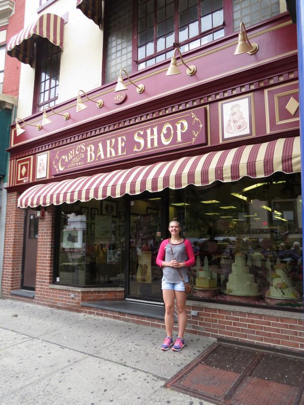 Abby at Carlo's Bakery store front