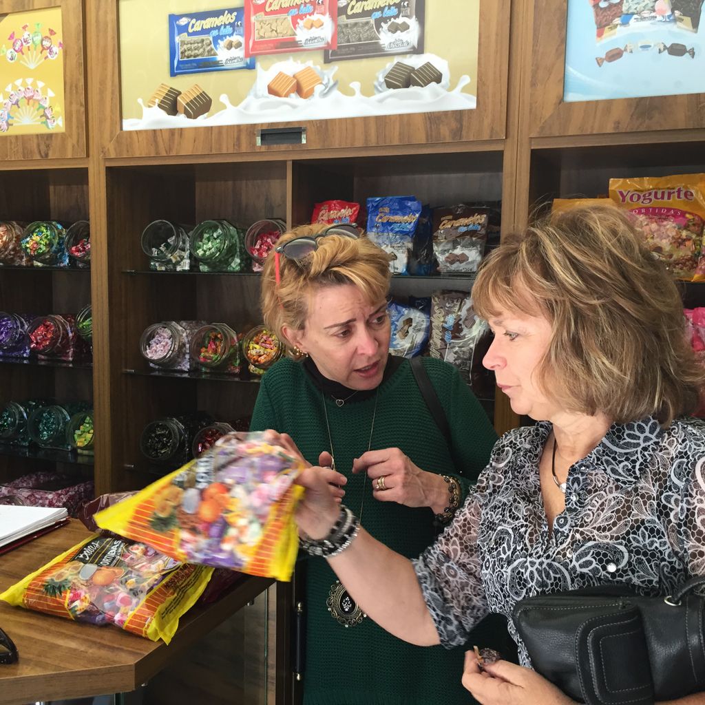 Concinha helps Sharon buy candy