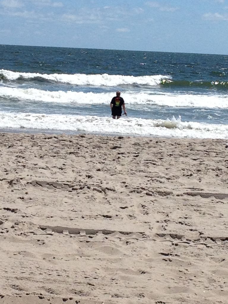 Dennis Knuth Wading in the Waves
