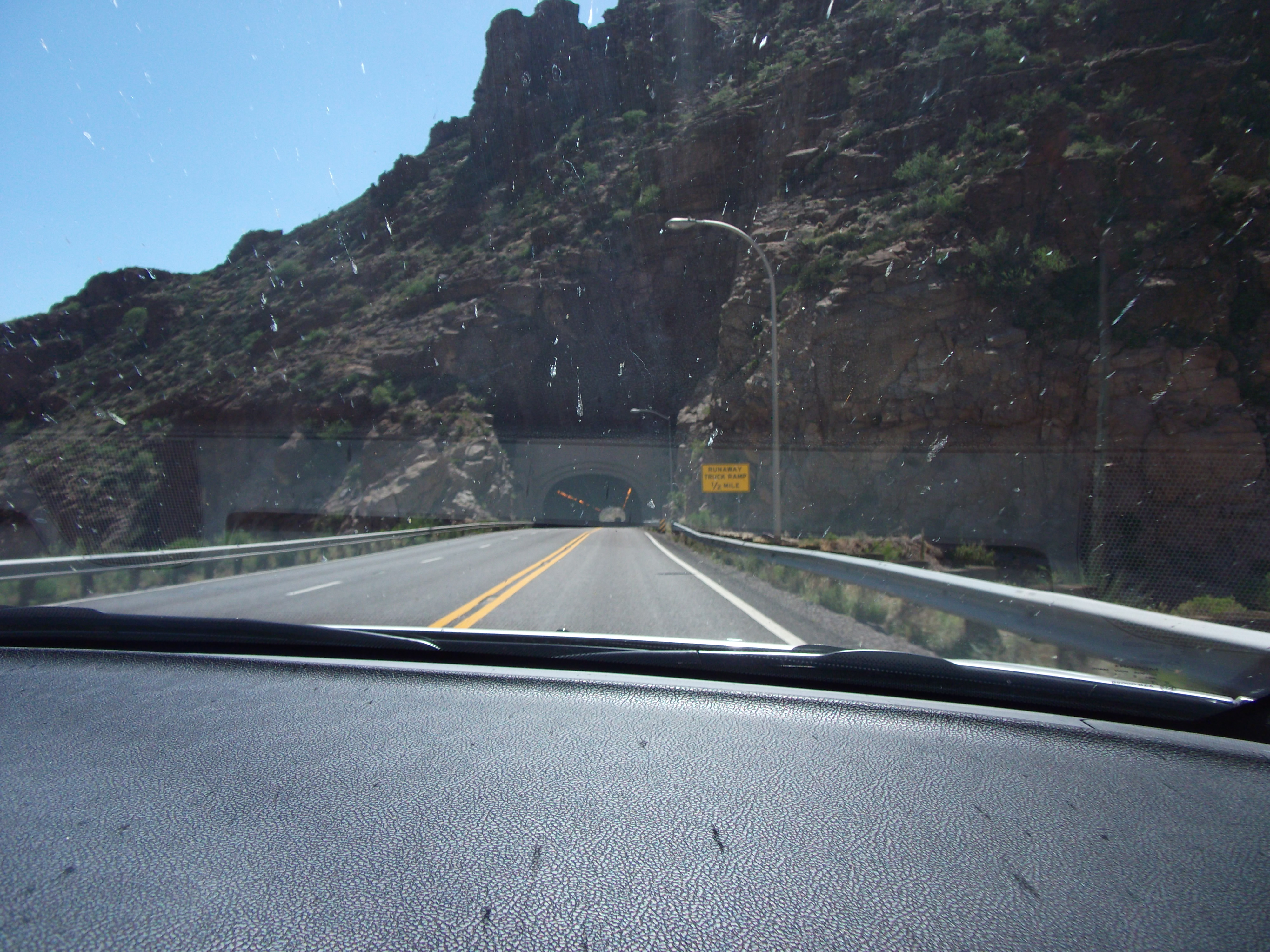 The sign says Runaway Truck ramp  1/2 mile