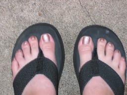Kerry Flip Flop Womans feet with painted toenails