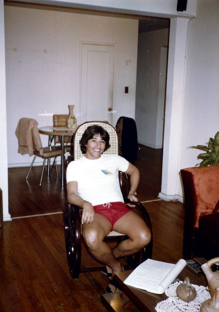 Sexy Tonio setting in a chair