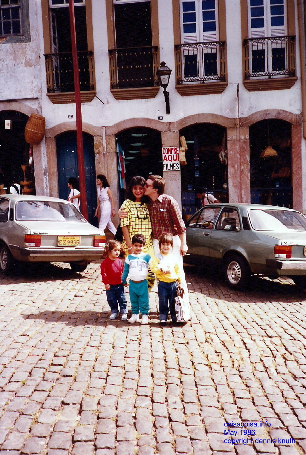 Peck on the cheek from Dennis