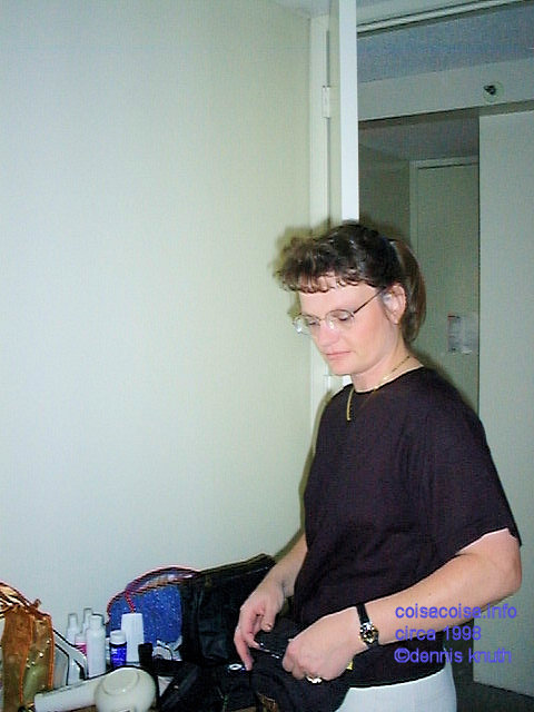 Sherri in Hawaii Condo getting her clothes arranged