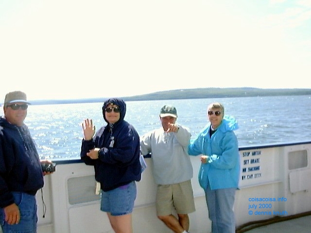 The family waves on the ferry
