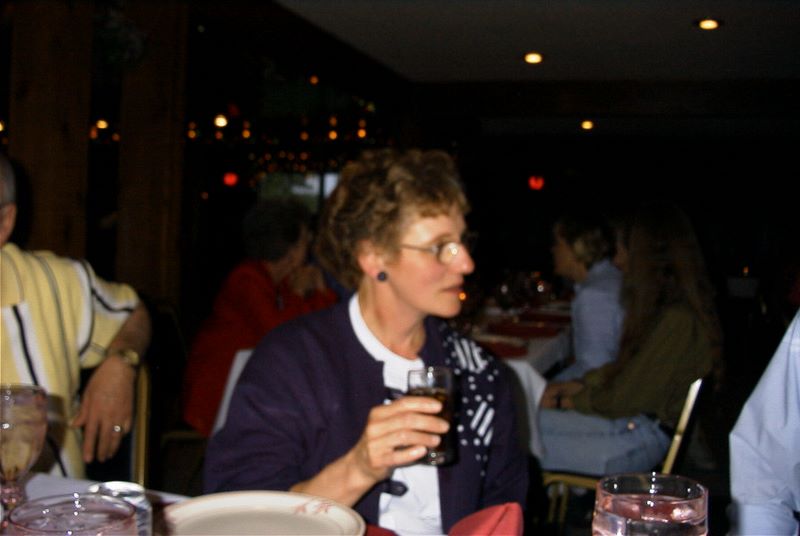 Nancy sips a drink