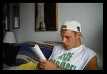 Justin checks the entertainment listings