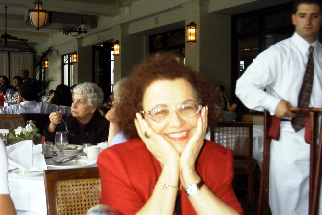 Janine smiles her winning smile