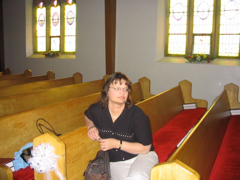 The grooms mother watches as her son Rehearses his wedding in Mondovi