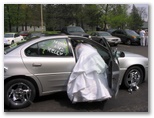It's hard trying to get into a small car with a wedding dress