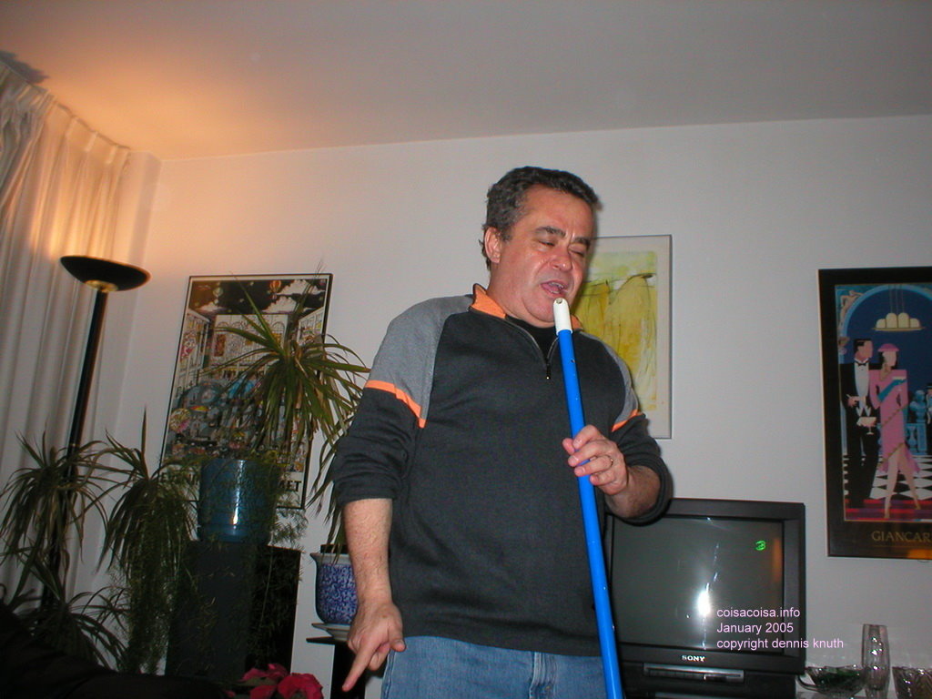 Helton Sings with a broom