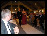 Nathan and bridesmaid coming down the aisle