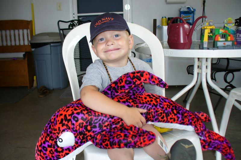 Happy with a stuffed animal