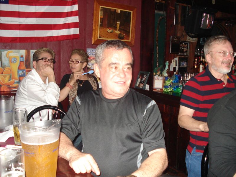 Helton with Dennis is the Background