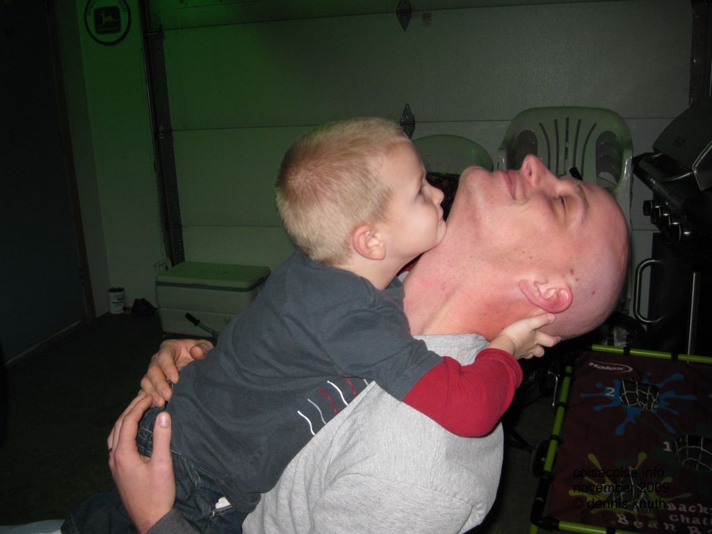 Nathan playing with his son