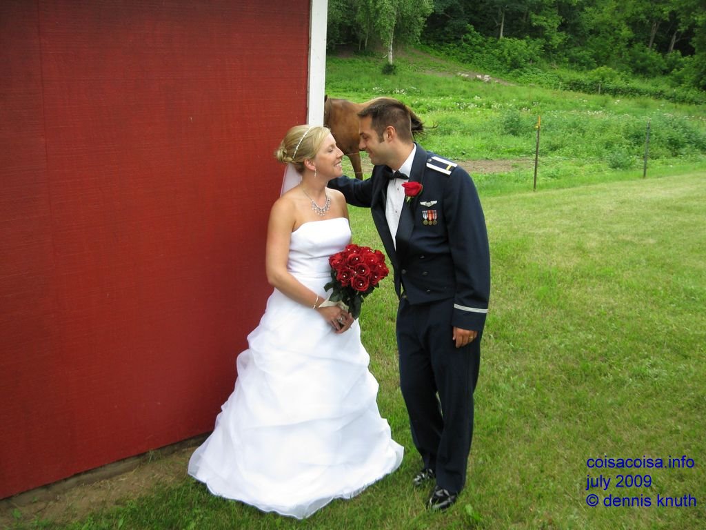 Getting ready to steal a kiss behind the barn