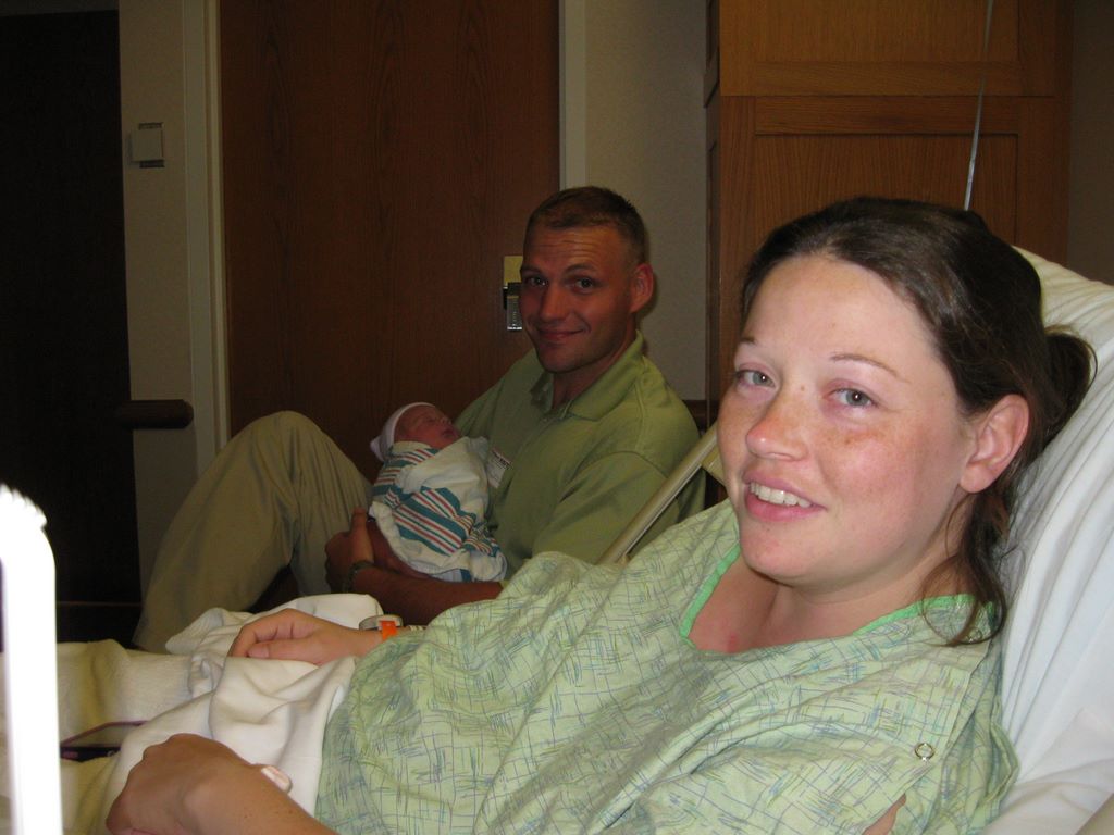 Colins' Mom and Dad with him