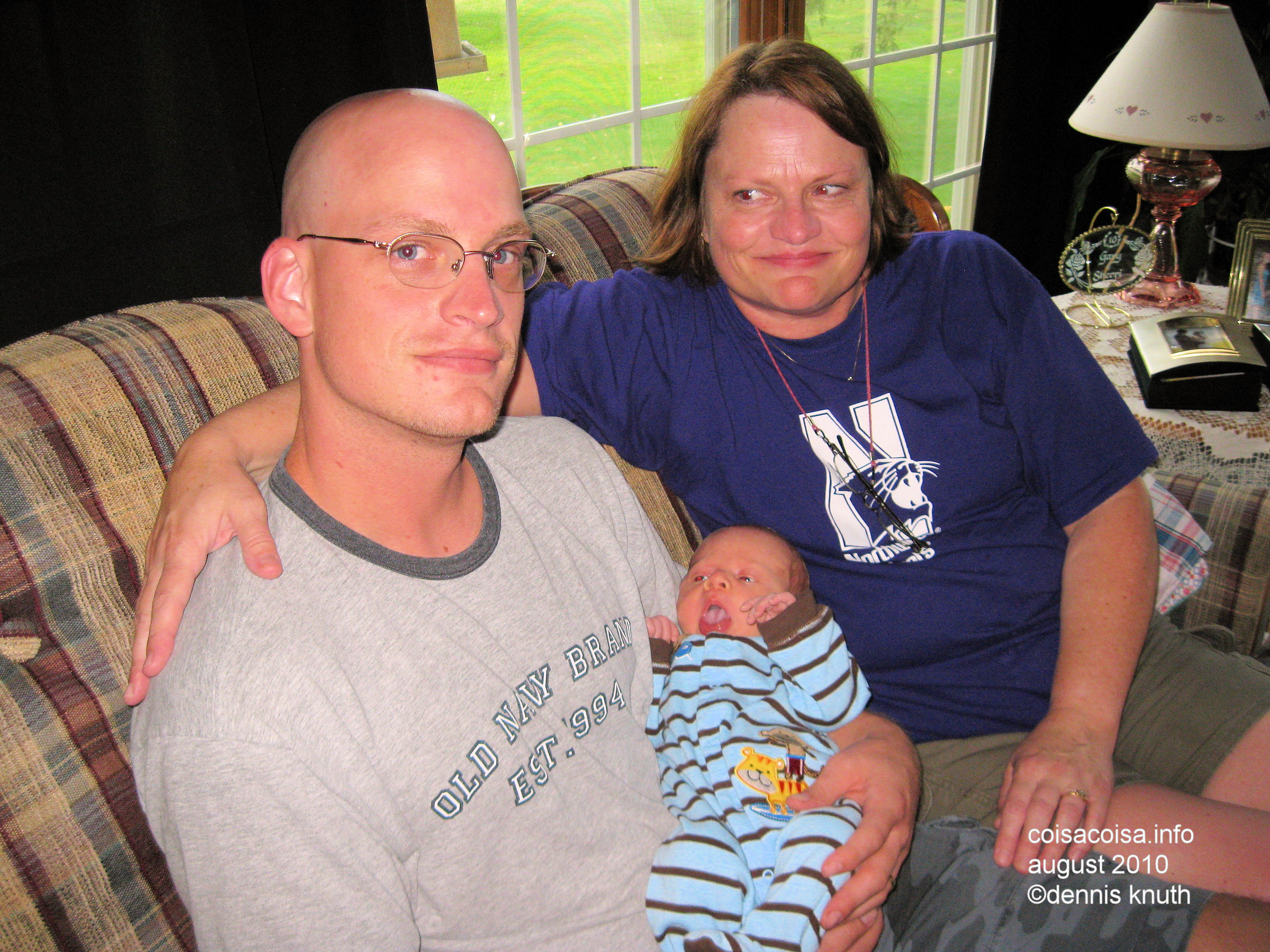 Grandma and son Nathan hold the new born Colin