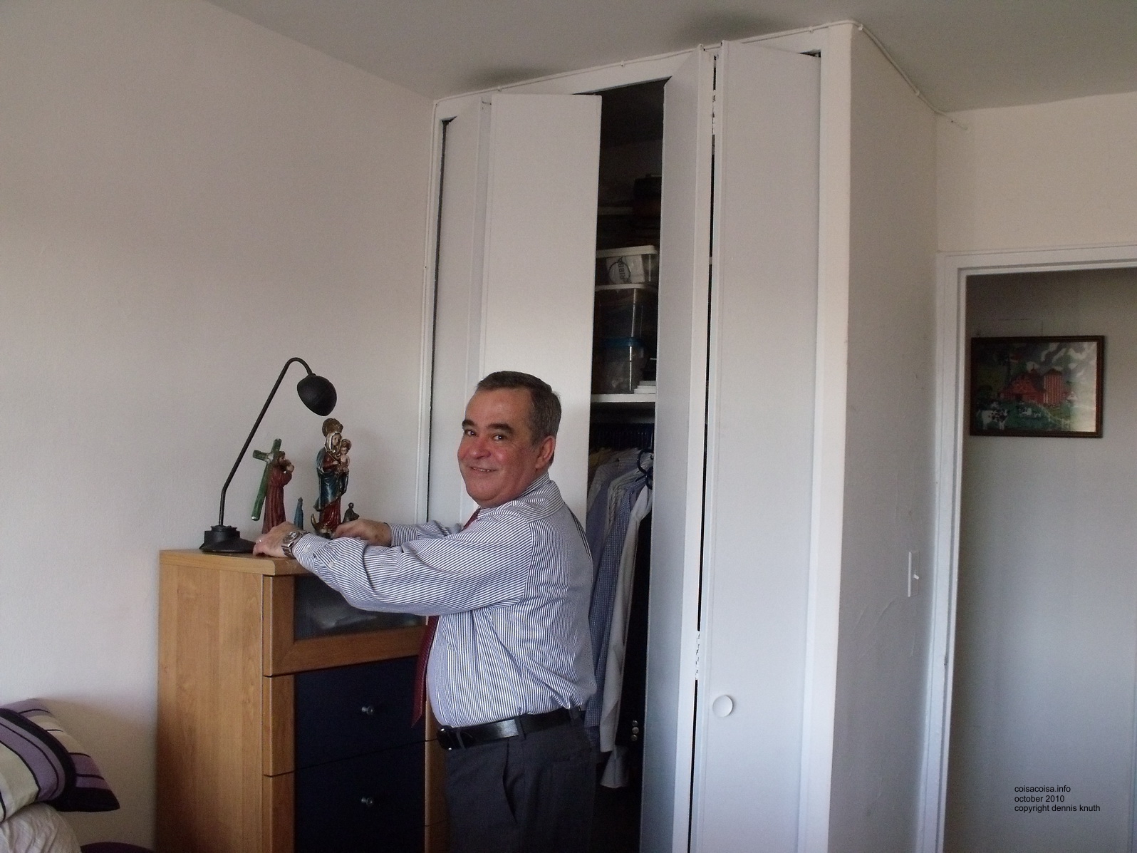 Helton Looking mischieveous by the bedroom dresser