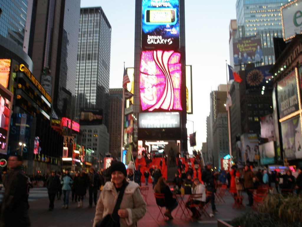 Lisette in Times Square at dusk