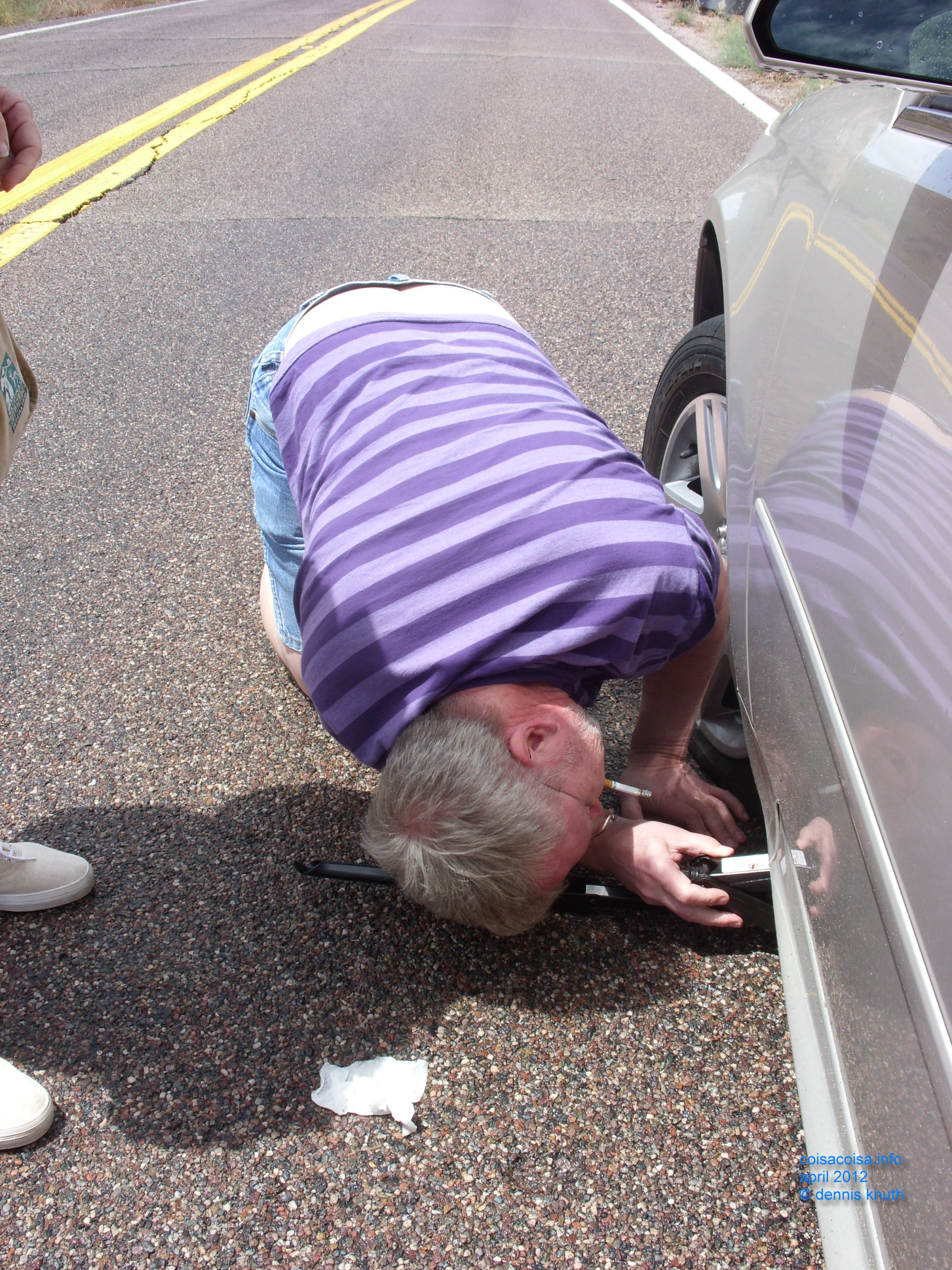Dennis Knuth placing the car jack on the frame